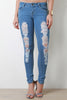 Distressed Mid Rise Skinny Jeans